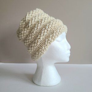 100% wool beige handmade knitted hat.